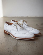 Designer Men white color wing tip Brogue lace up leather dress formal Shoe - angle-view-showing-depth