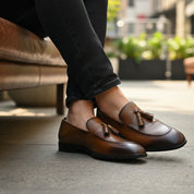 Brown Leather Tassels Moccasins - model-siting