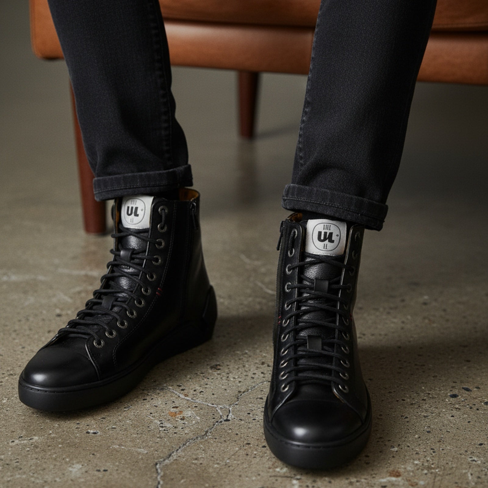 model-siting - Men's Black Leather Biker Sneakers