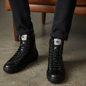 model-siting - Men's Black Leather Biker Sneakers