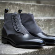 model-siting - Men's Black Leather Button Boots with Two-Toned Design