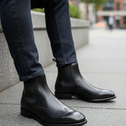 model-siting - Men's Black Leather Chelsea Boots
