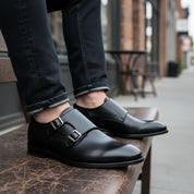 model-siting - Men's Black Leather Double Monk Strap Dress Shoes