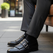 model-siting - Men's Black Leather Fringe Buckle Loafers