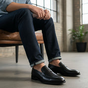 model-siting - Men's Black Leather Moccasins | Elegant Dress Design