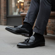 model-siting - Men's Black Leather Tassel Loafers