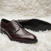 model-siting - Men's Black Leather Wingtip Brogue Dress Shoes