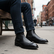 model-siting - Men's Black Leather Wingtip Chelsea Boots