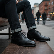 Men's Black Leather Wingtip Oxford Dress Shoes - model-siting