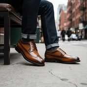 model-siting - Men's Black Leather Wingtip Oxford Shoes