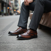 model-siting - Men's Brown Leather Wingtip Oxfords