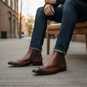 model-siting - Men's Full Grain Leather Wingtip Chelsea Boots