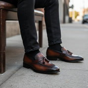 model-siting - Men's Shaded Tan Leather Tassel Loafers