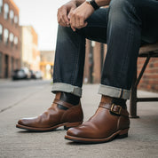 model-siting - Men's Tan & Black Two-Tone Leather Biker Boots