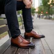 model-siting - Men's Tan Leather Wingtip Dress Shoes