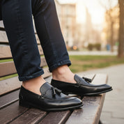 Black Leather Penny Loafers with Tassels - model-sitting-bench