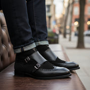 Men's Black Leather Monk Strap Chukka Boots - model-sitting-bench