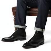 Men's Black Lace-Up Dress Boots in Genuine Leather & Suede - model-sitting-bench