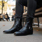 Men's Handmade Black Leather Boots with Side Zipper & Monk Strap - model-sitting-bench