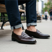 Men's Black Leather Moccasins - model-sitting-bench