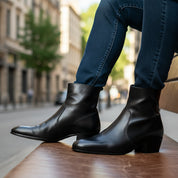 Men's Black Leather High Heel Dress Boots - model-sitting-bench