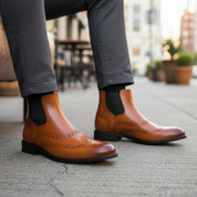 Men's Tan Leather Chelsea Boots - model-sitting-bench