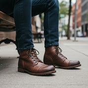 Men's Antique Brown Leather High Ankle Biker Boots - model-sitting-bench