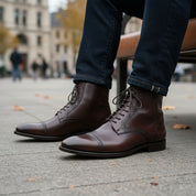 Men's Black Cap Toe Ankle Leather Lace-up Boots - model-sitting-bench