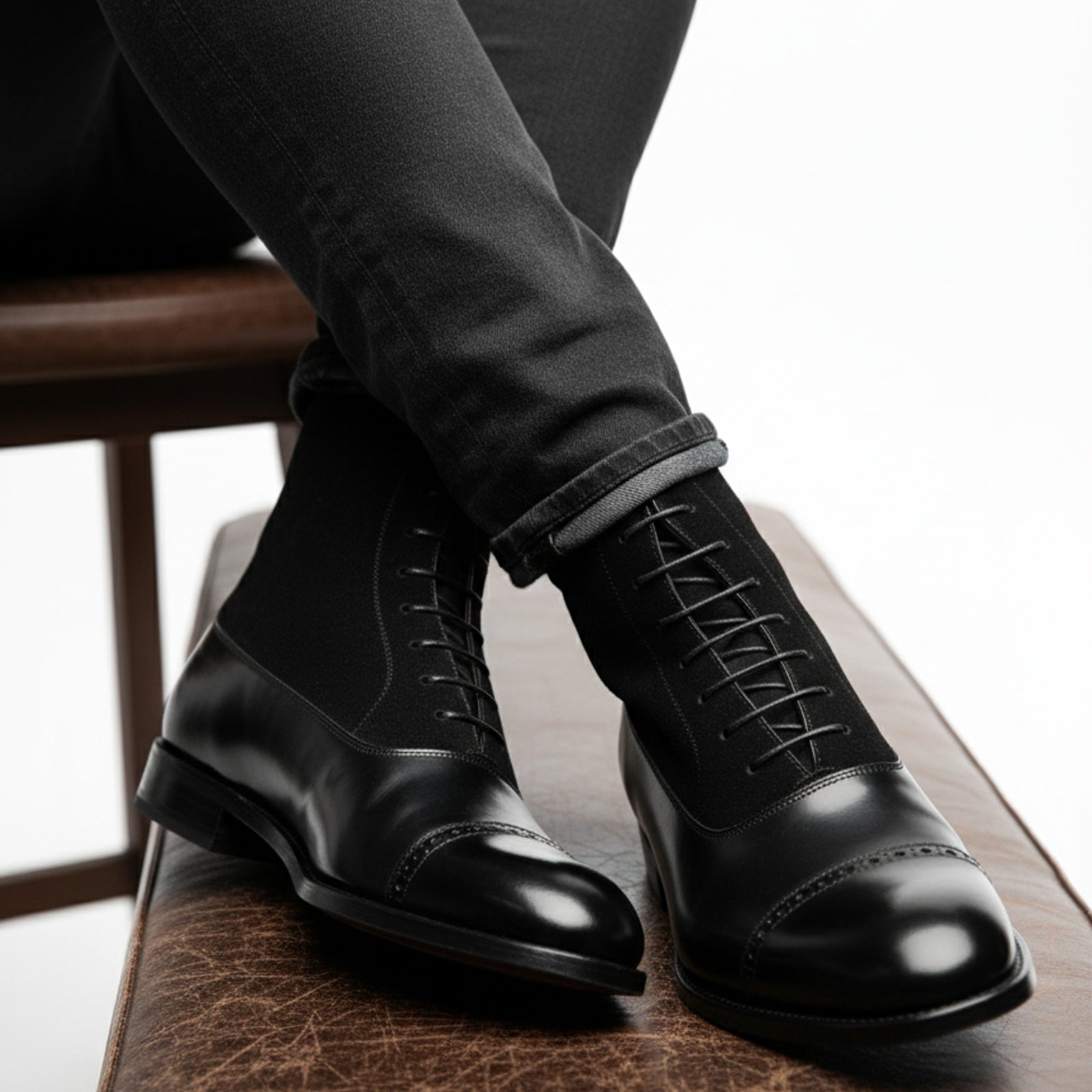Men's Black Cap Toe Lace-Up Ankle Boots - model-sitting-bench