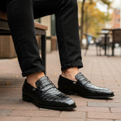 Men's Black Crocodile Embossed Leather Moccasins - model-sitting-bench