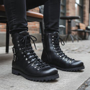 Men's Black Leather Biker Ankle Boots - model-sitting-bench