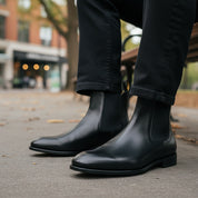 model-sitting-bench - Men's Black Leather Chelsea Ankle Boots