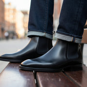 model-sitting-bench - Men's Black Leather Chelsea Boots