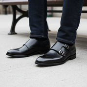 model-sitting-bench - Men's Black Leather Double Monk Strap Dress Shoes