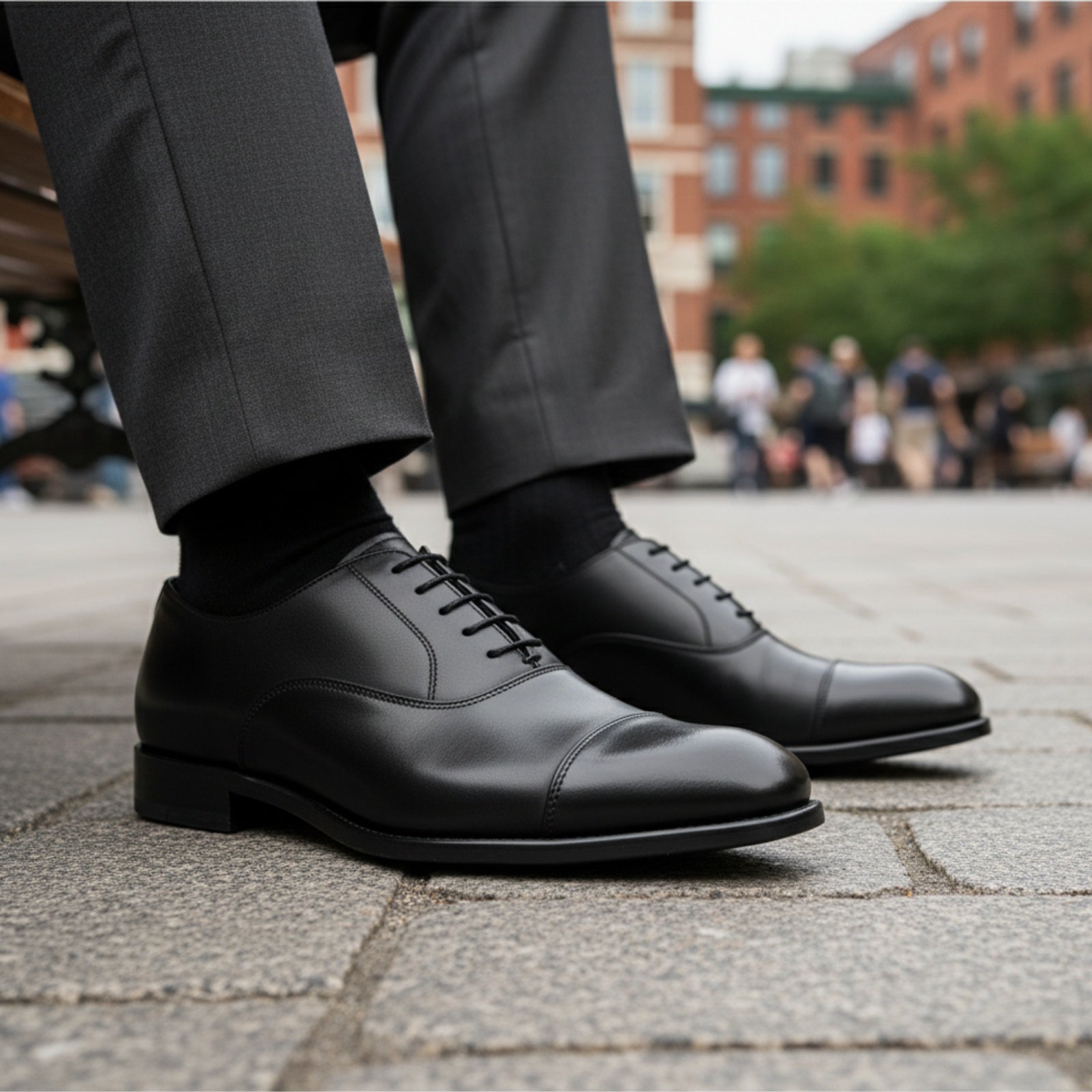 Men's Black Leather Lace-Up Oxfords - model-sitting-bench
