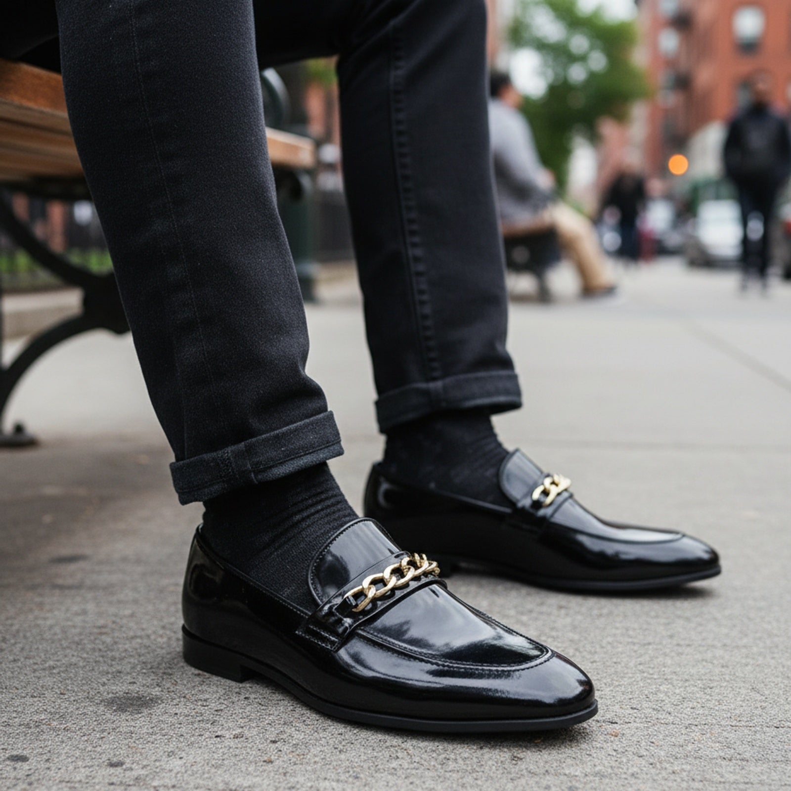 model-sitting-bench - Men's Black Leather Loafers with Chunky Chain