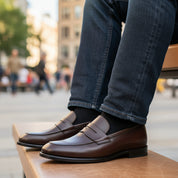 model-sitting-bench - Men's Black Leather Moccasins