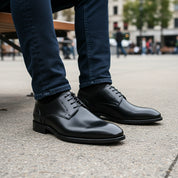 model-sitting-bench - Men's Black Leather Oxford Dress Shoes with Lace-Up Closure