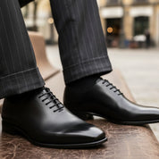 model-sitting-bench - Men's Black Leather Oxford Shoes with Classic Lace-Up