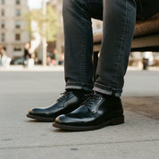 model-sitting-bench - Men's Black Leather Oxford Shoes