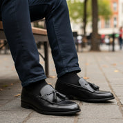 model-sitting-bench - Men's Black Leather Tassel Fringe Moccasins