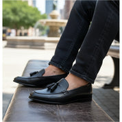 model-sitting-bench - Men's Black Leather Tassel Moccasins