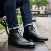 model-sitting-bench - Men's Black Leather Tuxedo Boots