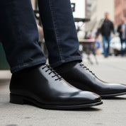 Men's Black Oxford Leather Dress Shoes - model-sitting-bench