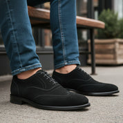 model-sitting-bench - Men's Black Suede Wingtip Brogue Dress Shoes