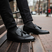 model-sitting-bench - Men's Black Tassel Leather Moccasins