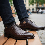 Men's Brown Alligator Print Leather Dress Shoes - model-sitting-bench