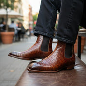 model-sitting-bench - Men's Brown Chelsea Boots in Calf Leather with Crocodile Pattern