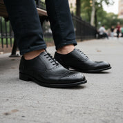 model-sitting-bench - Men's Brown Leather Brogue Dress Shoes