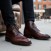 Men's Brown Leather Cap Toe Ankle Boots - model-sitting-bench